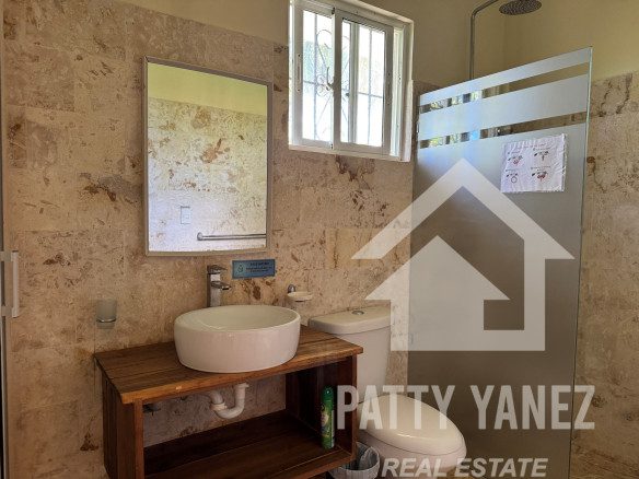 Hotel boutique en venta con villa de 9 habitaciones cerca de una playa privada en Cabarete