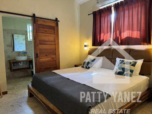Hotel boutique en venta con villa de 9 habitaciones cerca de una playa privada en Cabarete