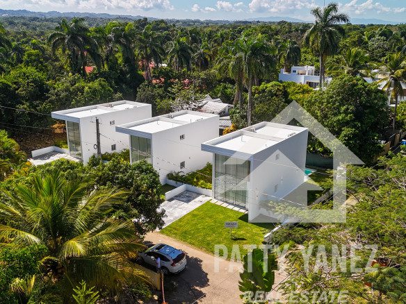 Villa nueva de 2 recámaras en una comunidad frente al mar
