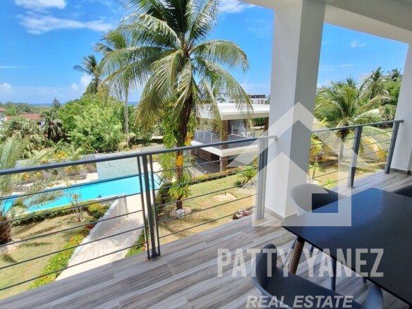 Condominio moderno de 2 recámaras cerca de la playa de Encuentro: amueblado, con vista al mar y a la alberca 
